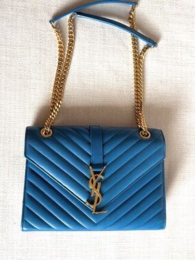 Yves Saint Laurent Envelope Blue
Chevron Quilted Shoulder Bag w/ Gold Chain
